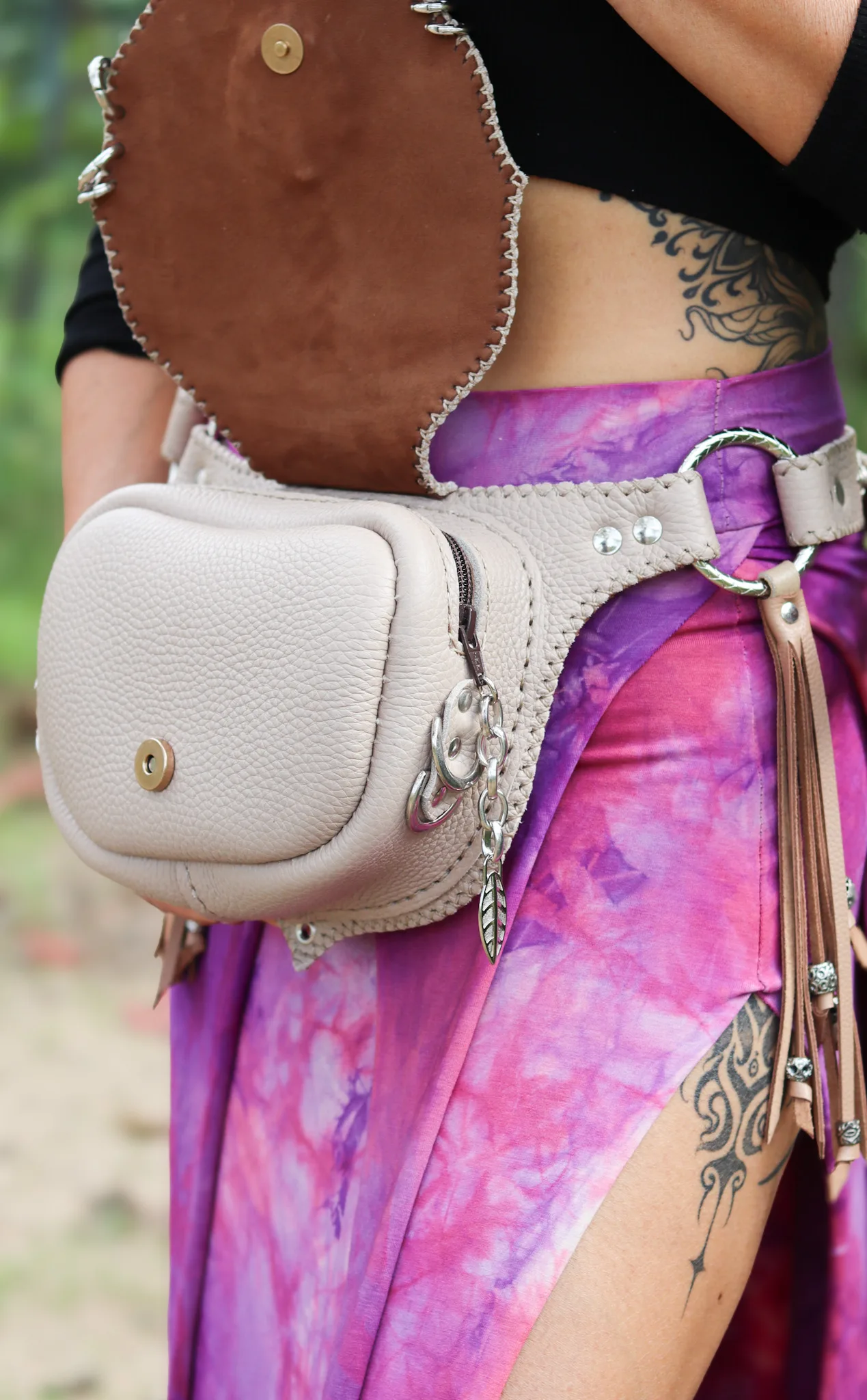 Artisan beige belt bag with gemstone and braided edges by Siga Tribal.