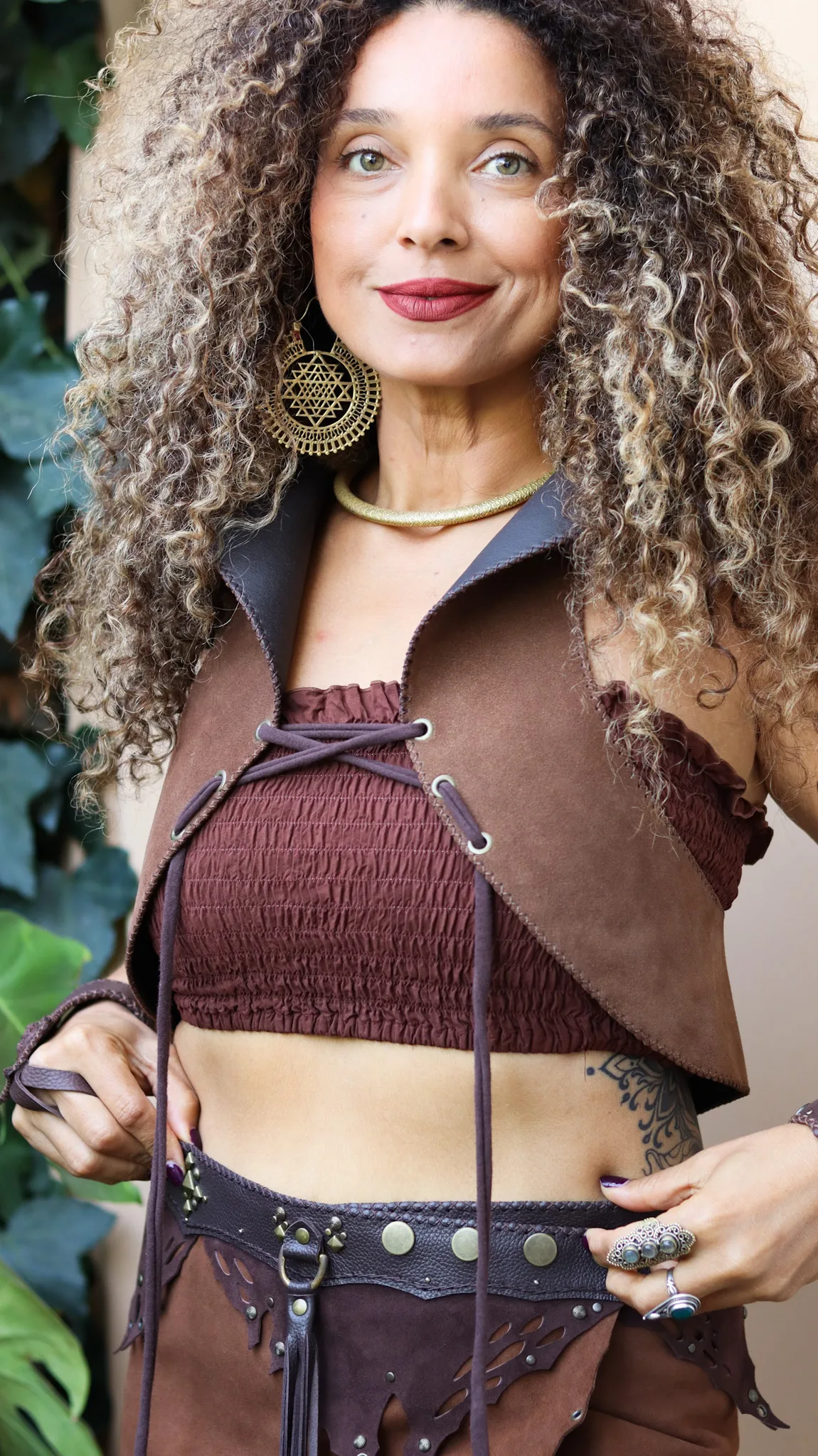handmade earth-toned brown suede vest with natural agate gemstone and antique gold details by Siga Tribal