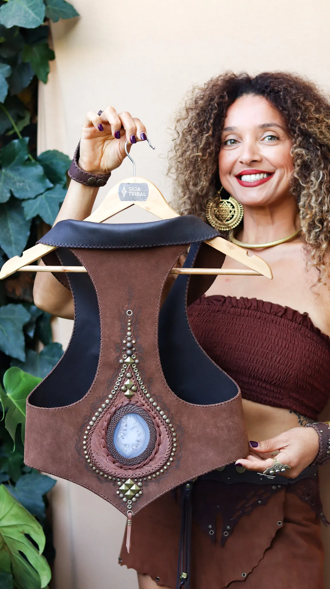 handmade earth-toned brown suede vest with natural agate gemstone and antique gold details by Siga Tribal