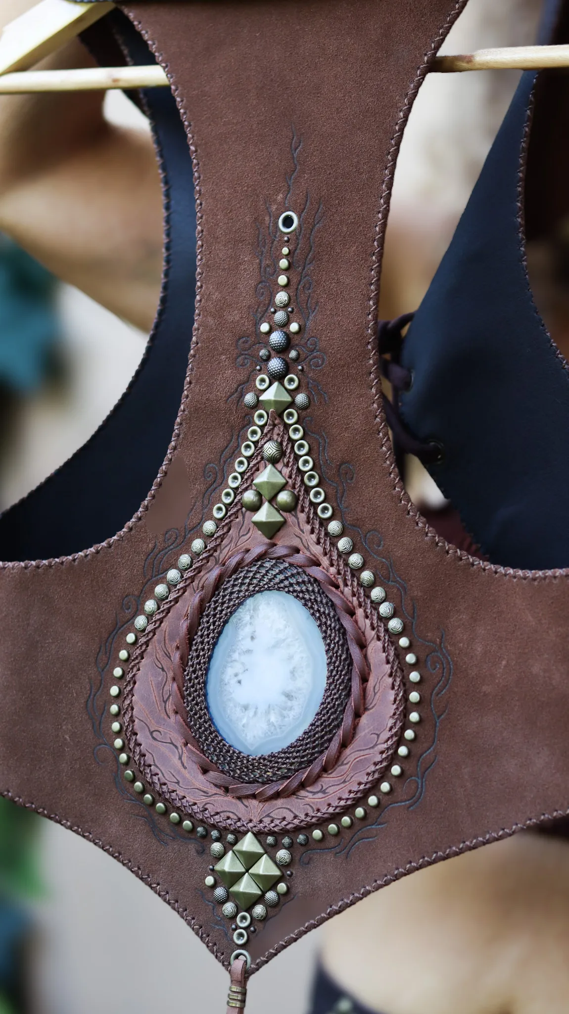 handmade earth-toned brown suede vest with natural agate gemstone and antique gold details by Siga Tribal