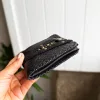 Handmade ORIN leather wallet with snake-embossed texture and antique gold studs