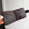 RUMA Wallet is a handmade brown leather wallet with snake-embossed texture and antique gold studs. Crafted in Portugal by Siga Tribal.