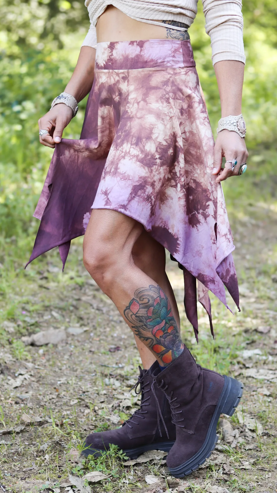 Irregular hemline detail of tie dye skirt · SIGA Tribal