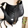 Black leather bag with sculptural design and natural stone detail. Handmade in Portugal. Ready to ship.