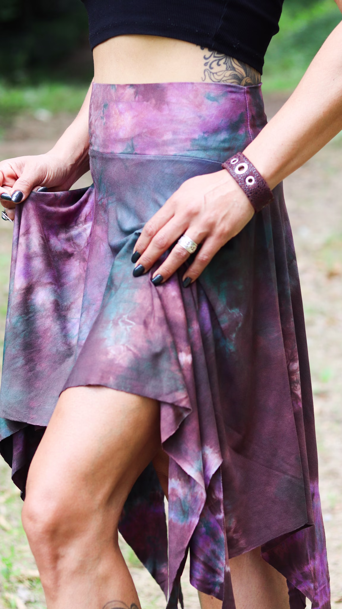 Dusty Plum asymmetrical pixie skirt by SIGA TRIBAL featuring hand-dyed purple and teal tones with flowing pointed hem.